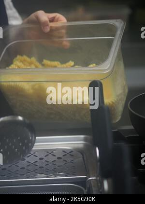 Pasta boiler in professional kitchen of restaurant Stock Photo