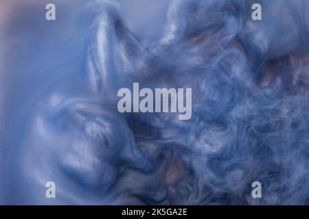 Abstract fluid acrylic painting. Marbled blue abstract Ink cloud on background. Liquid marble pattern. Modern art.  Stock Photo