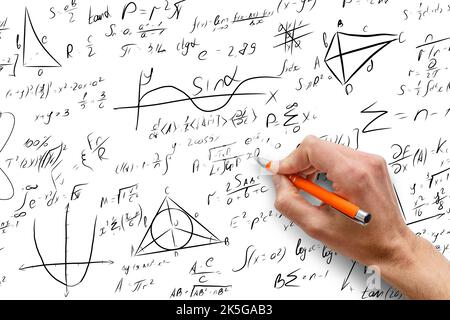 pen writes mathematical equations on whiteboard Stock Photo