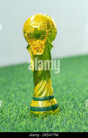 KUALA LUMPUR, MALAYSIA - OCTOBER 02, 2022 : World cup trophy replica with world cup concept. Stock Photo