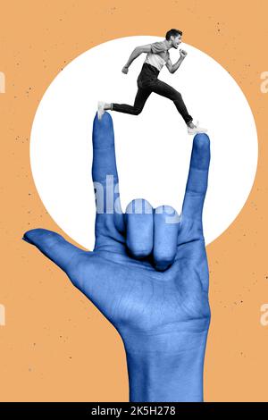 Photo artwork minimal picture of happy smiling guy jumping between fingers showing hard rock sign isolated drawing background Stock Photo
