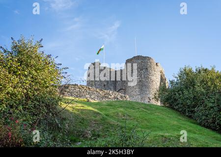 Criccieth Castle with Welsh flag flying  in Criccieth, Gwnydd, Wales on 2 October 2022 Stock Photo
