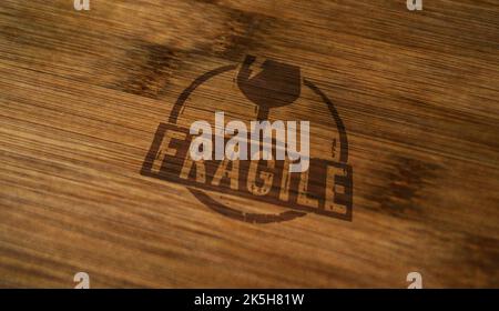 Fragile stamp printed on wooden box. Careful shipping and handle with care concept. Stock Photo