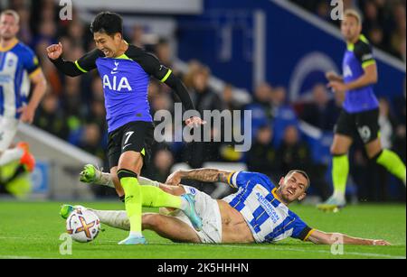 Brighton, East Sussex, UK. 08 Oct 2022 - Brighton and Hove Albion v Tottenham Hotspur - Premier League - Amex Stadium  Tottenham's Heung-Min Son is tackled by Lewis Dunk during the Premier League match against Brighton. Picture : Mark Pain / Alamy Live News Stock Photo