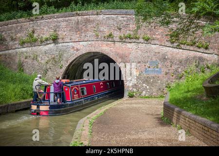 NORTHAMPTONSHIRE, UK - May 25, 2022. Narrowboat (narrow boat) enters the Blisworth Tunnel on the Grand Union Canal near Stoke Bruerne Stock Photo
