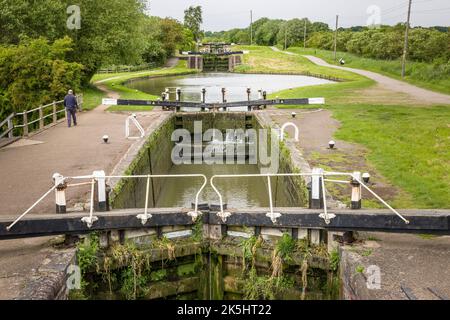 NORTHAMPTONSHIRE, UK - May 25, 2022. Series of canal locks on the Grand Union Canal at Stoke Bruerne Stock Photo