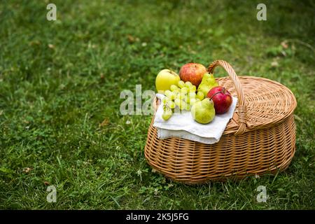 High angle picnic basket with fruit Stock Photo