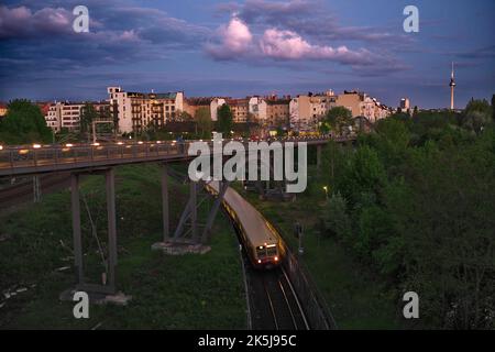 Germany, Berlin, 04. 05. 2020, view to Schwedter Steg, back building gable of Kopenhagener Strasse, from Behmbruecke, S-Bahn Stock Photo