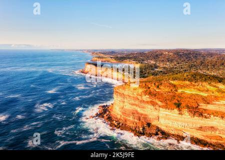 Coastlien of Sydney Northern beaches of headlands and scenic beaches on Pacific coast of Australia- morning aerial landscape. Stock Photo