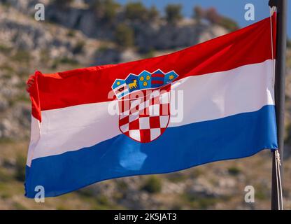 DUBROVNIK, CROATIA, EUROPE - Croatia flag flying on pole. Stock Photo