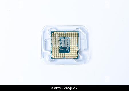 Computer processor CPU  Central processing unit microchip  isolated on white background Closeup  the bottom side, socket contact for personal computer Stock Photo