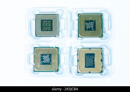 Computer processor CPU  Central processing unit microchip  isolated on white background Closeup  the bottom side, socket contact for personal computer Stock Photo