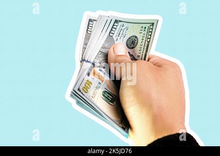 Hand holding american dollars, close up collage on blue background. Modern design, contemporary art collage. Stock Photo