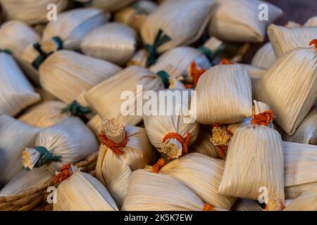 Mexican tamales filed corn dough, Spicy food or candy in Mexico Stock Photo