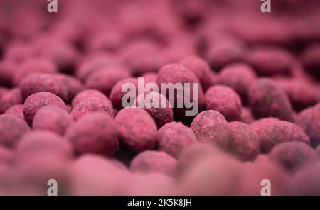 Candies in the shape of eggs, sweets background. Stock Photo