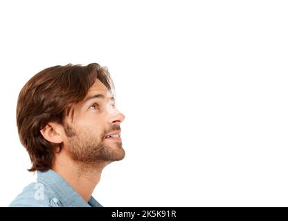 Going through the motions. a man posing in the studio against a white background. Stock Photo