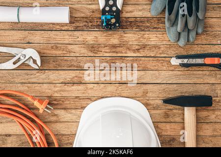 Flat lay composition with different construction tools on wooden background. Stock Photo