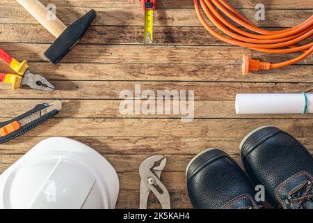 Flat lay composition with different construction tools on wooden background. Stock Photo
