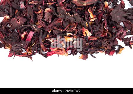Karkade tea. Bunch of dry hibiscus tea isolated on white background, top view Stock Photo