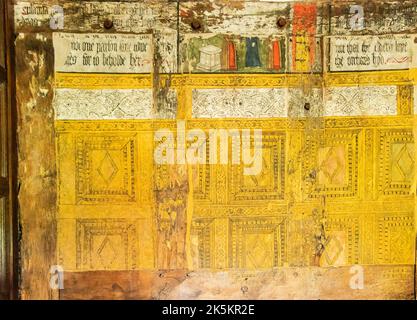 painted wall panel in  Tudor half timbered moated National Trust house Little Moreton Hall CONGLETON Cheshire Stock Photo