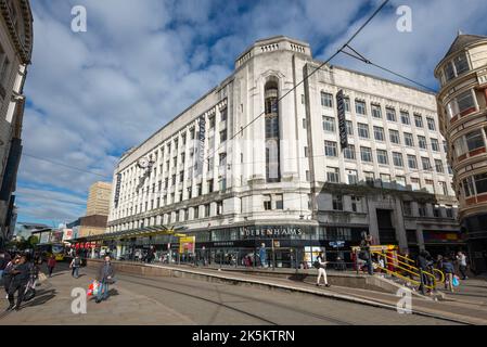 Market Street Manchester with Tram station and old Debenhams building. Manchester city centre, England. Stock Photo