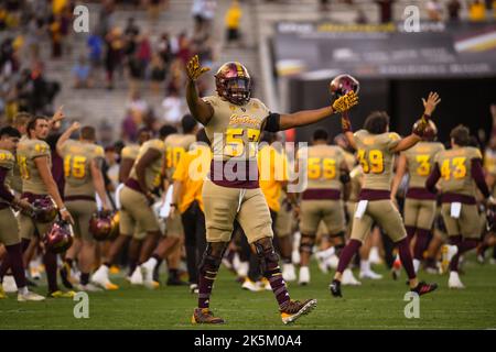 Arizona State offensive linemen Armon Bethea (57) celebrates a victory after an NCAA college football game against the Washington Huskies in Tempe, Ar Stock Photo