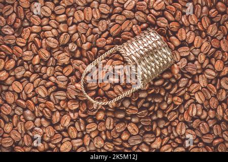 Roasted coffee beans background. Top view with copy space. Stock Photo