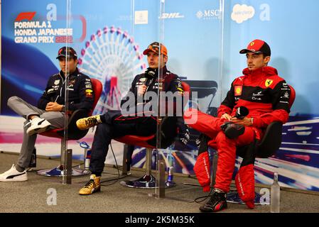 From left to right: Sergio Perez (MEX) Red Bull Racing, Max Verstappen (NLD) Red Bull Racing and Charles Leclerc (MON) Ferrari, portrait in the post race FIA Press Conference during the Formula 1 Honda Japanese Grand Prix 2022, 18th round of the 2022 FIA Formula One World Championship from Octobre 7 to 9, 2022 on the Suzuka International Racing Course, in Suzuka, Mie Prefecture, Japan - Photo: Dppi/DPPI/LiveMedia Stock Photo