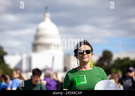 Washington, United States. 08th Oct, 2022. An activist with Rise Up for Abortion Rights stands in front of the US Capitol at the conclusion of the Women's March for reproductive rights. The march was the flagship event of a nationwide 'Women's Wave' protest in hundreds of cities across the United States. (Photo by Allison Bailey/SOPA Images/Sipa USA) Credit: Sipa USA/Alamy Live News Stock Photo