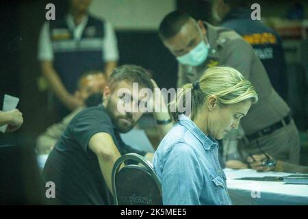 October 9, 2022, Uthai Sawan, Nong Bua Lamphu, Thailand: CNN reporter Anna Coren and cameraman Daniel Hodge sit as they talk to Thai government officials in an administrative building near the site of the day care center massacre where they illegally trespassed to film a news segment 2 days earlier. (Credit Image: © Adryel Talamantes/ZUMA Press Wire) Credit: ZUMA Press, Inc./Alamy Live News Stock Photo