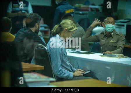 October 9, 2022, Uthai Sawan, Nong Bua Lamphu, Thailand: CNN reporter Anna Coren and cameraman Daniel Hodge sit as they talk to Thai government officials in an administrative building near the site of the day care center massacre where they illegally trespassed to film a news segment 2 days earlier. (Credit Image: © Adryel Talamantes/ZUMA Press Wire) Credit: ZUMA Press, Inc./Alamy Live News Stock Photo