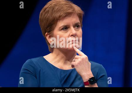 Aberdeen, Scotland, UK. 9th October 2022.  Deputy First Minister John Swinney gives speech to the delegates. PIC; First Minister Nicola Sturgeon listens to speech.  Iain Masterton/Alamy Live News Stock Photo