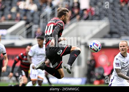 Sydney, Australia. 8th October 2022 : CommBank Stadium, Sydney, Australia; A-League football Western Sydney Wanderers versus Perth FC; Milos Ninkovic of Western Sydney Wanderers jumps to strike the ball Credit: Action Plus Sports Images/Alamy Live News Stock Photo