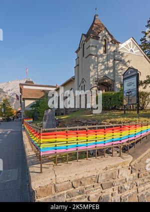 Banff, Alberta, Canada – October 07, 2022:  Rundle Memorial United Church decorated for the Gay Pride celebrations Stock Photo