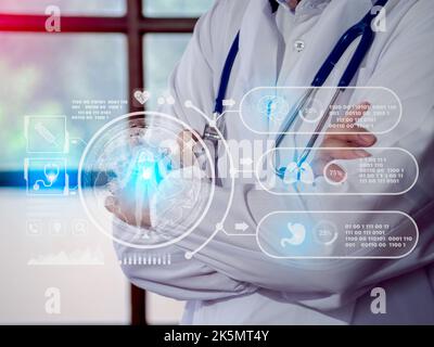 Male medicine doctor embrace with stethoscope looking icon medical network connection with modern virtual screen interface against of chest on hospita Stock Photo