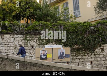 Menton, France - April 20, 2022: Electoral posters with Emmanuel Macron and Marine le Pen before the second round of presidential elections in France. Stock Photo