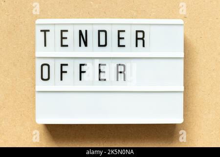 Lightbox with word tender offer on wood background Stock Photo