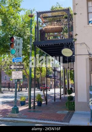 Herbsaint Restaurant at the Corner of Girod Street and St. Charles Avenue in New Orleans, LA, USA on October 2, 2022 Stock Photo