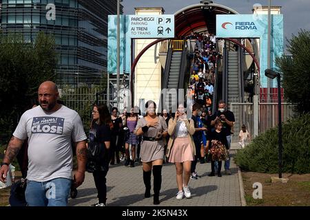 Visitors arrive at the Nuova Fiera di Roma, home of the 29th edition of Romics, international exhibition of comics, animation, video games, cinema and entertainment. The term "Cosplay", a constraint of "costume play", indicates the practice of wearing a costume that represents a fictional character. (Photo by Vincenzo Nuzzolese / SOPA Images/Sipa USA) Stock Photo