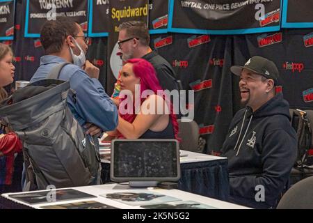 NEW YORK, NEW YORK - OCTOBER 08: Ice T and wife Coco interact with attendees during New York Comic Con 2022 at Jacob Javits Center on October 08, 2022 in New York City. Credit: Ron Adar/Alamy Live News Stock Photo