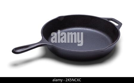 Cast Iron Cooking Skillet Pan Top View Cut out on White. Stock Photo