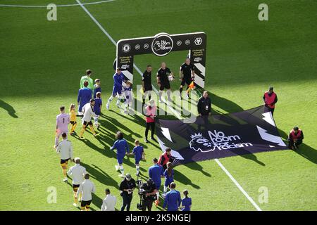 Fulham, London, UK. 8th Oct, 2022. Chelsea and Wolves players enter the pitch for the 8th game of the Premier League 2022/23 season, in front of the Premier League signage to stamp out racism in the sport. Credit: Motofoto/Alamy Live News Stock Photo
