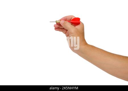 Hand holds dart for playing darts in red, on a white background of isolate.Concept striving for a goal in business and life Stock Photo