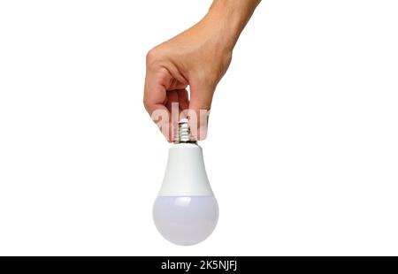 LED eco light bulb in hand on white background Stock Photo