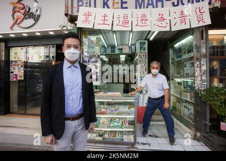(L to R) Lawmaker Scott Leung Man-Kwong and Cheung Shun-king, Mahjong tile artisan and owner of Biu Kee Mah-Jong, poses for a picture at Biu Kee Mah-Jong in Jordan. The old mahjong tile shop is forced to close at the end of October as it is evicted by the Buildings Department.  06OCT22 SCMP/ Jonathan Wong Stock Photo