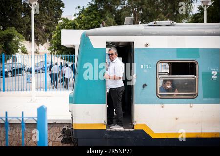 Sousse, Tunisia-17.09.2019: Central metro station of the city, Sousse. Conductor of the train in the first car, looking towards the station. While the Stock Photo