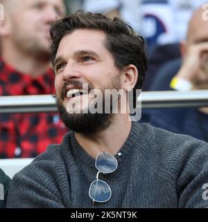London, UK. 09th Oct, 2022. British actor Kit Harrington enjoys the football during the match against the Green Bay Packers in the NFL International Series game at White Hart Lane in London on Sunday, October 09, 2022. The Giants beat the Packers 27-22. Photo by Hugo Philpott/UPI Credit: UPI/Alamy Live News Stock Photo