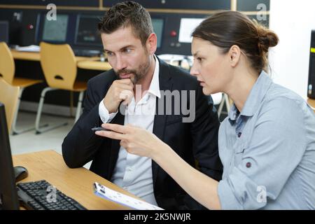 man and women designing in studio Stock Photo