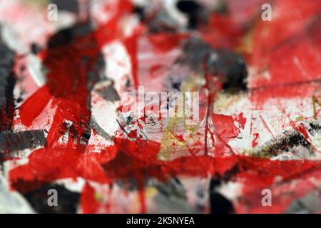 Interesting colors and textures embracing creativity and all the colors of life! A closeup of a paper covered with different paints in a process. Stock Photo