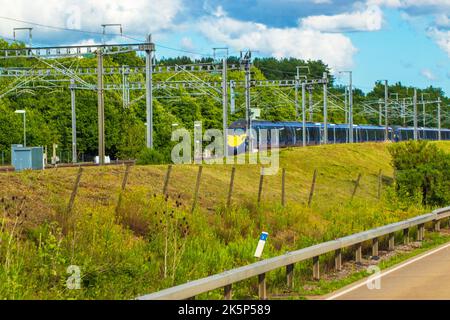 High speed train line near Ashford.The British Rail Class 395 Javelin is a dual-voltage electric multiple-unit passenger train,England,June 2022 Stock Photo